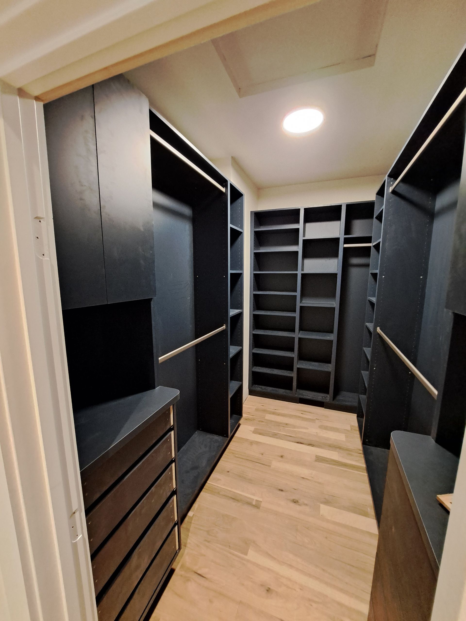 Stylish and functional closet systems designed and built by Olson Cabinets & Woodworking in Victoria, MN.
