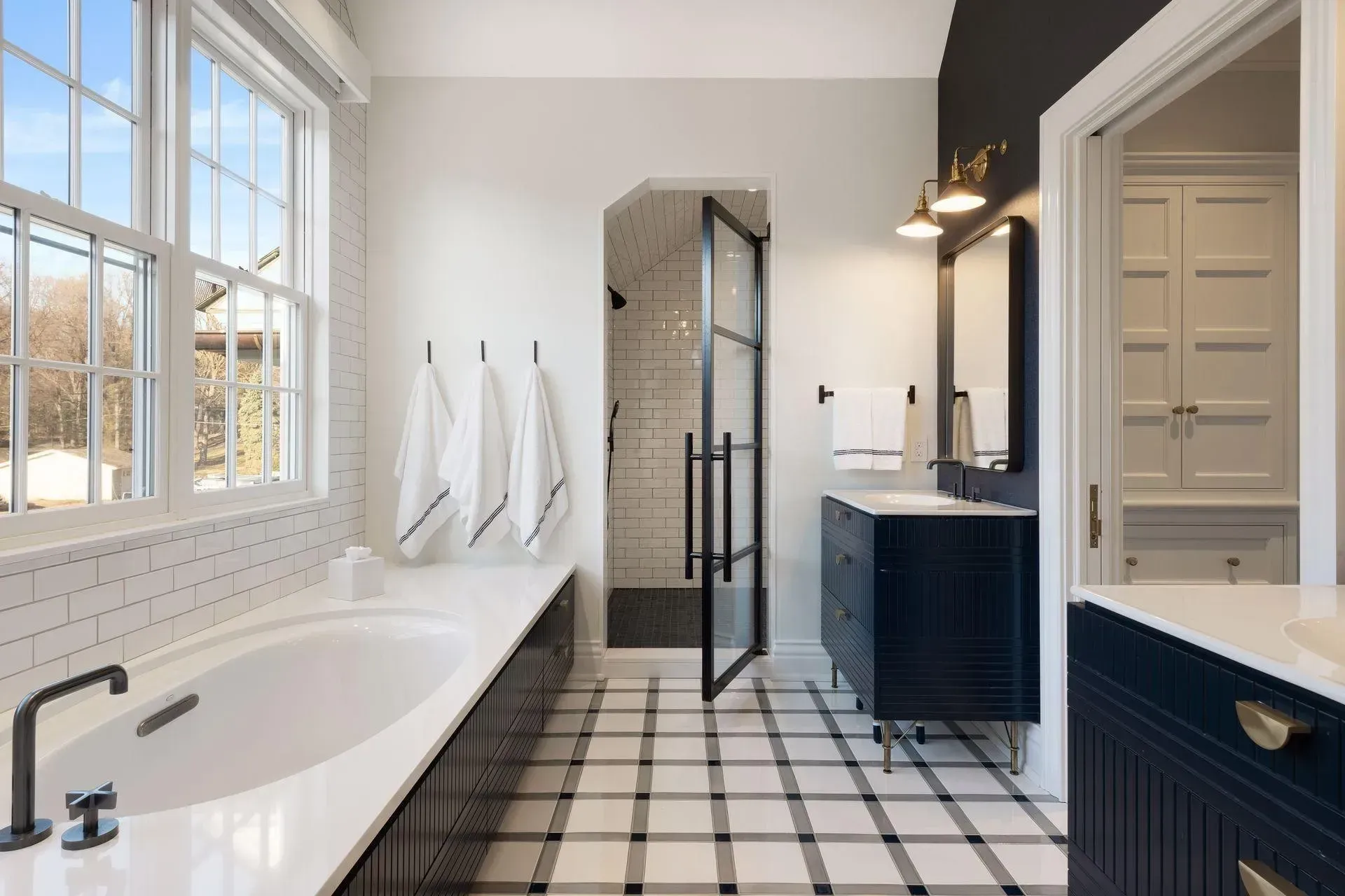 Finished bathroom with granite counter and marble floor Finished bathroom with granite counter and marble floor
