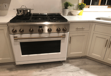 Modern Kitchen Stove — Victoria, MN — Olson Cabinets & Woodworking Inc.
