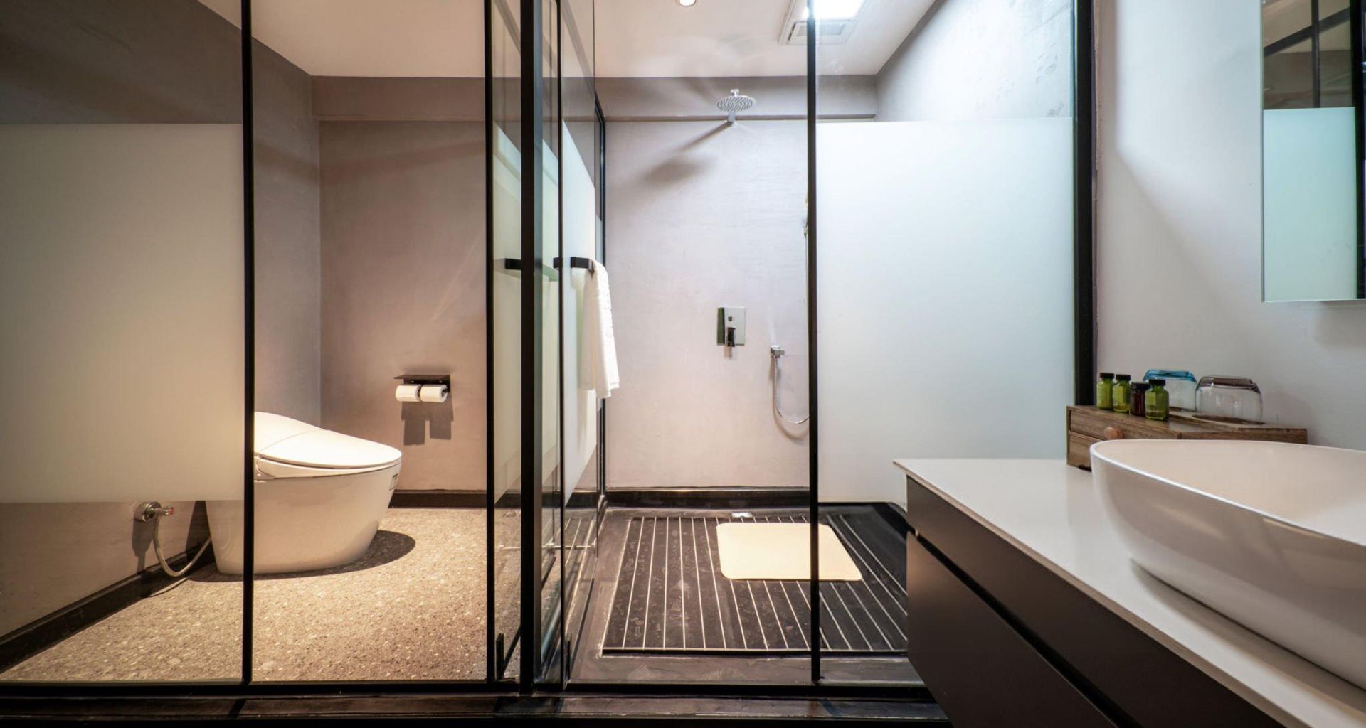 A shower door installation in a modern bathroom features sleek glass and contemporary fixtures. A shower door installation in a modern bathroom features sleek glass and contemporary fixtures.