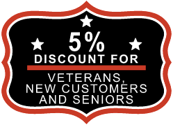A sign that says `` 5 % discount for veterans , new customers and seniors ''.