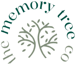 The logo for the memory tree company shows a tree with leaves.