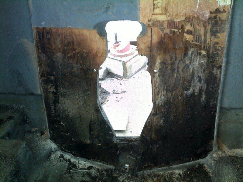 Water damaged and rotted wood transom on a boat