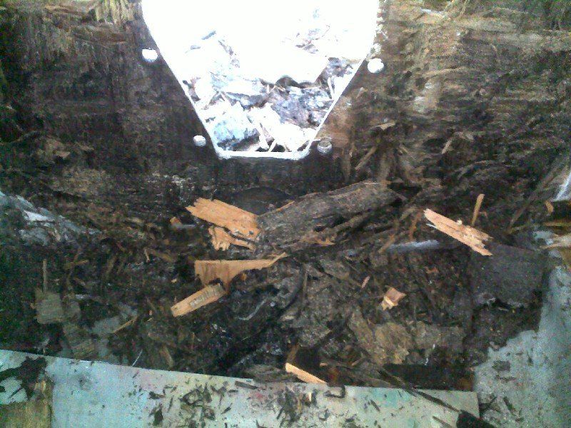 Water damaged and rotted wood transom on a boat