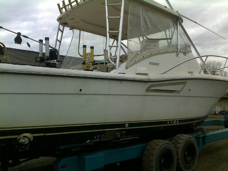 Boat with faded and dirty gelcoat finish