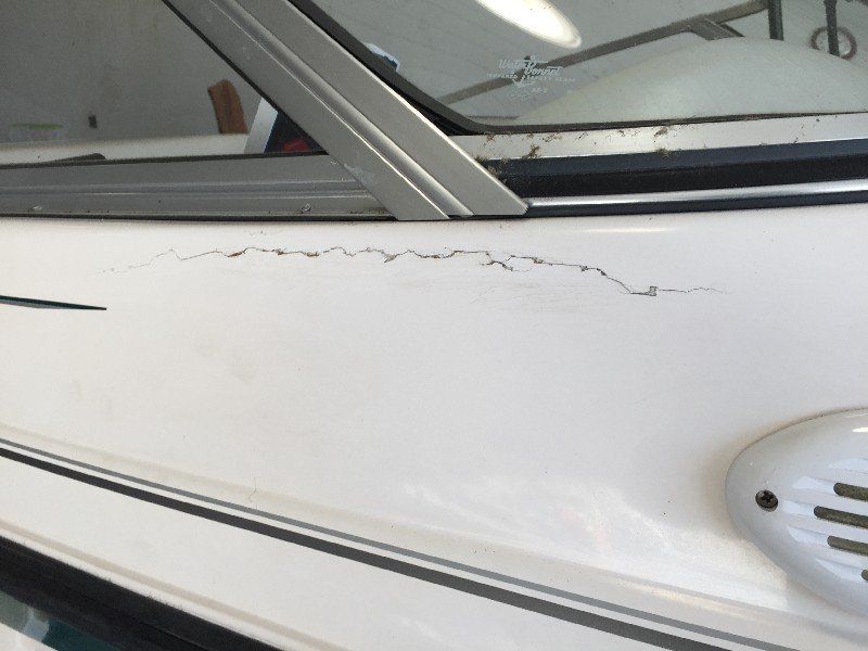 Boat with side impact damage