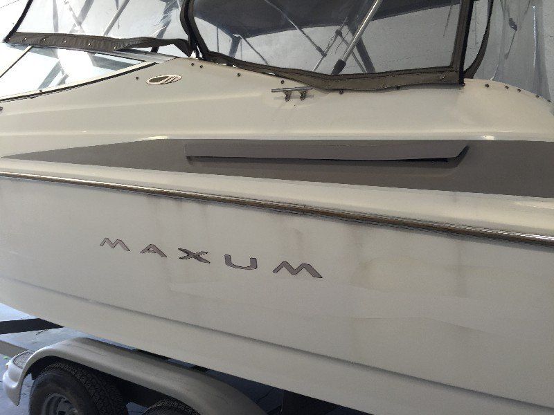 Boat with faded and oxidized gelcoat finish