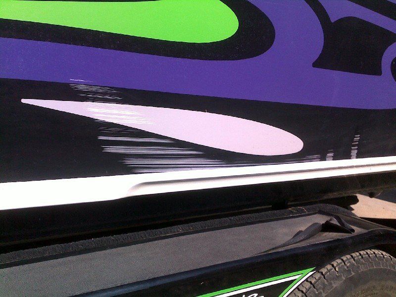 Boat with damage to gelcoat through numerous colors