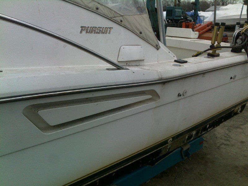 Boat with faded and dirty gelcoat finish
