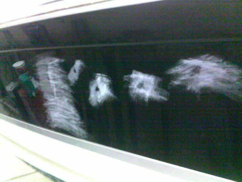 Black base clearcoat damage on boat