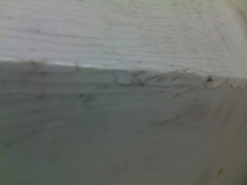 Boat bottom hull with severe fiberglass impact damage