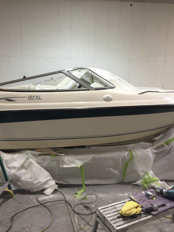 Boat with side impact damage in the repair process