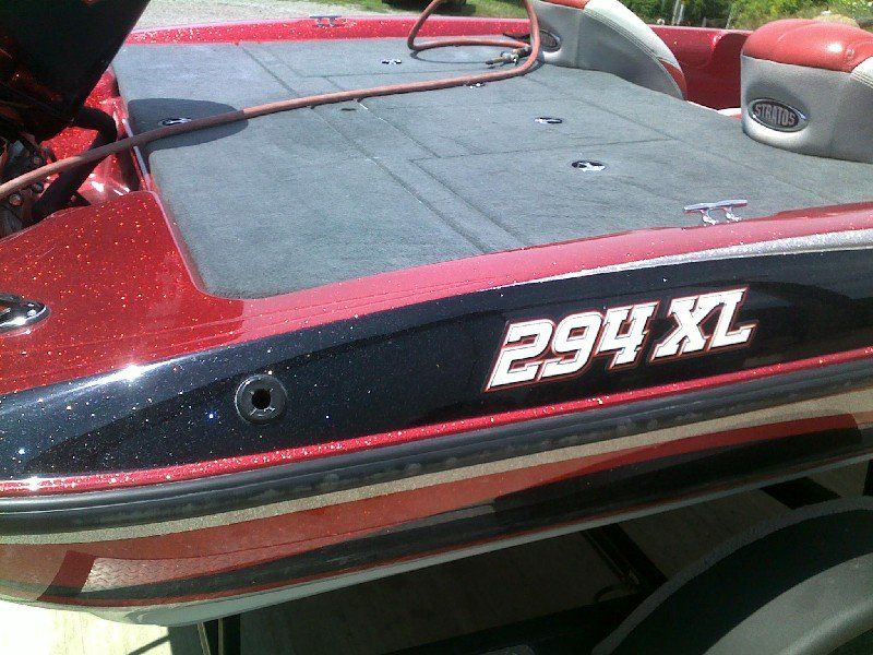 Boat that has had fiberglass and metalflake repaired after impact damage
