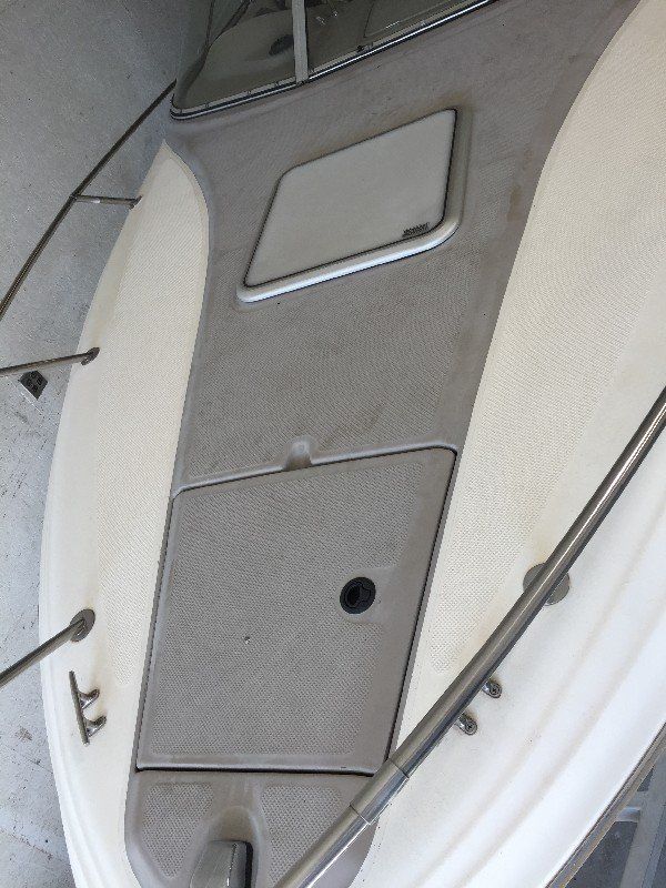 Boat with faded and oxidized gelcoat finish