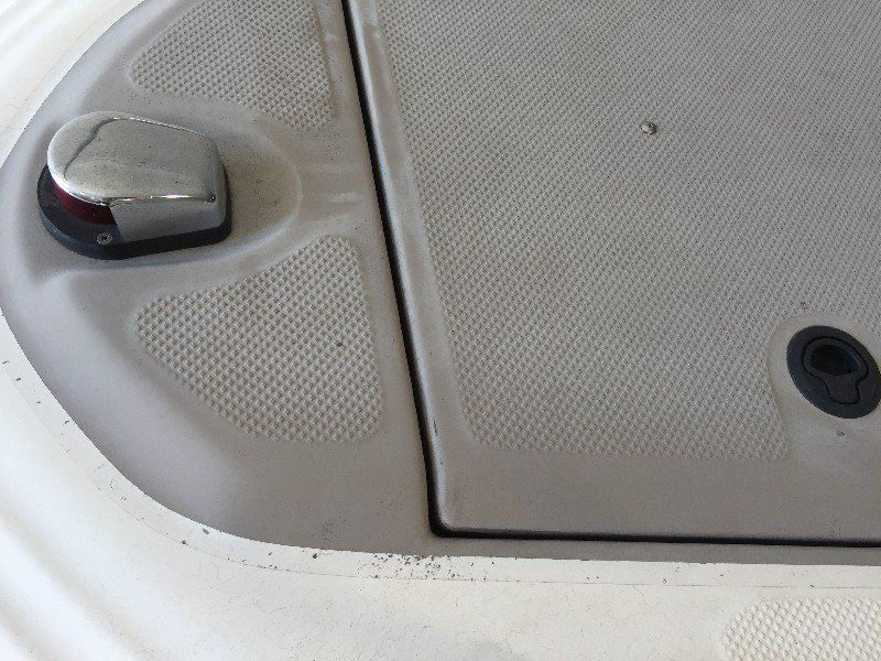 Boat with faded and oxidized gelcoat finish