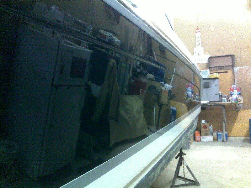 Black base clearcoat repair completed on boat