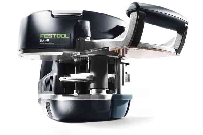 A festool machine is sitting on a white surface.