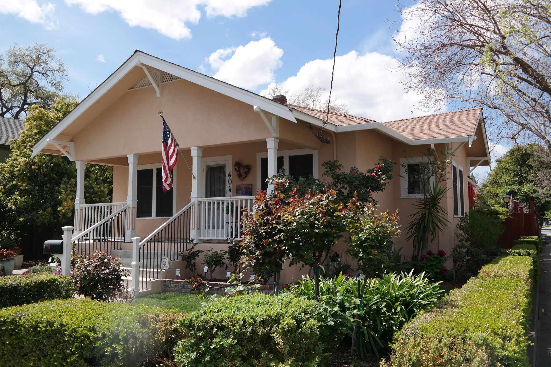 A house with an american flag on the porch