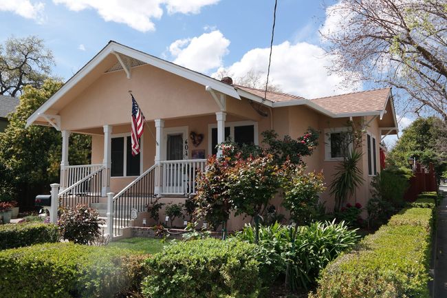 A house with an american flag on the porch