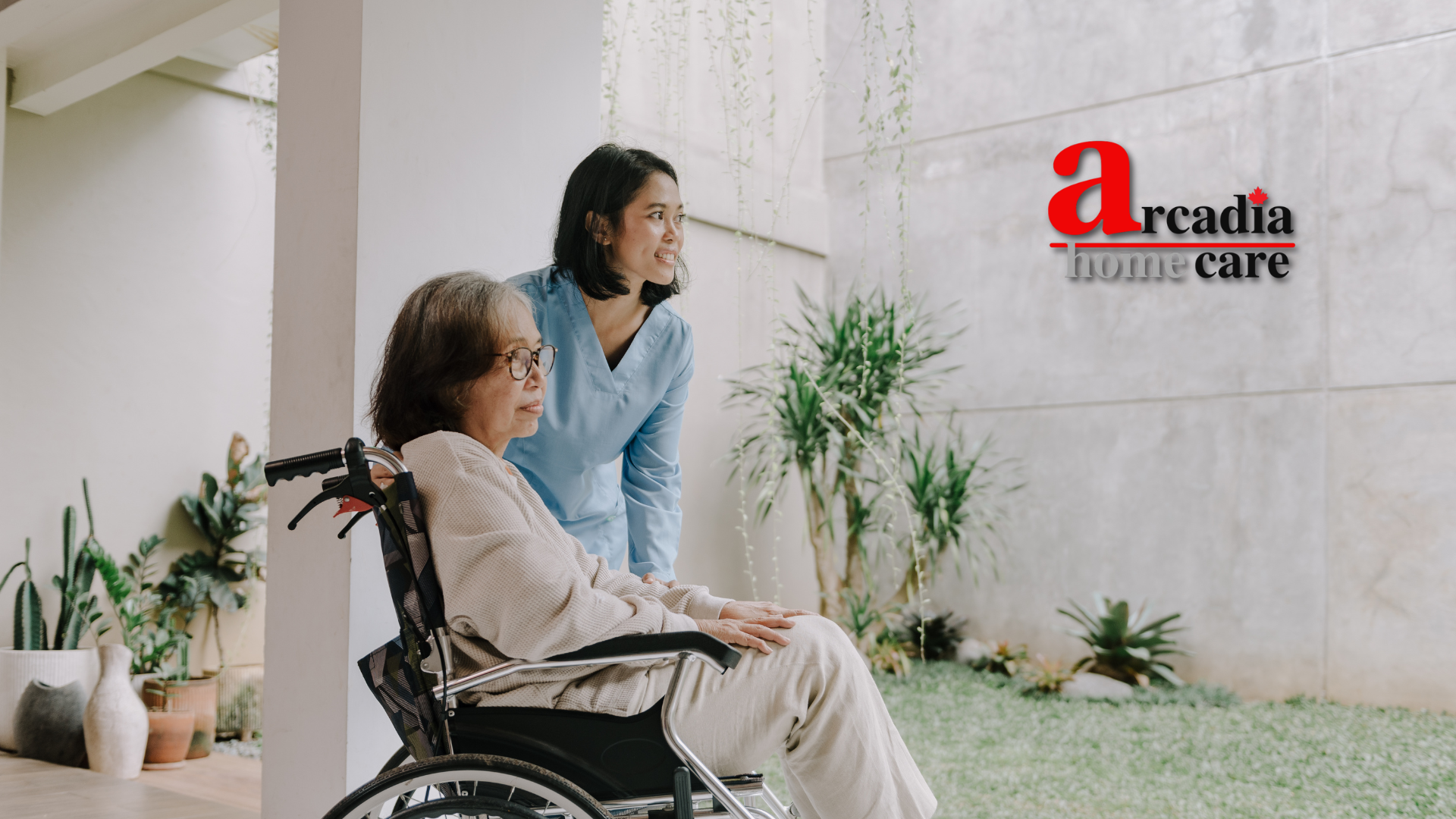 An elderly woman in a wheelchair is being helped by a nurse.