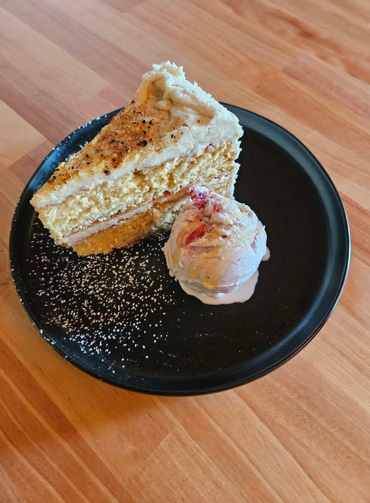 cake on a black plate 2