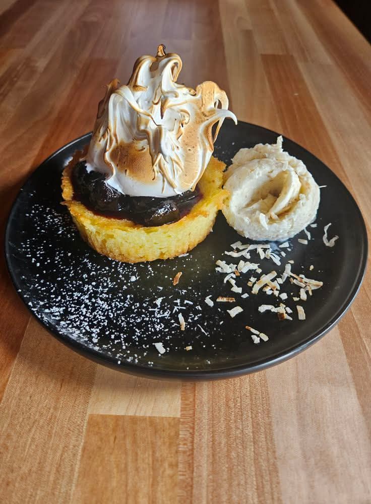 cake on a black plate 3