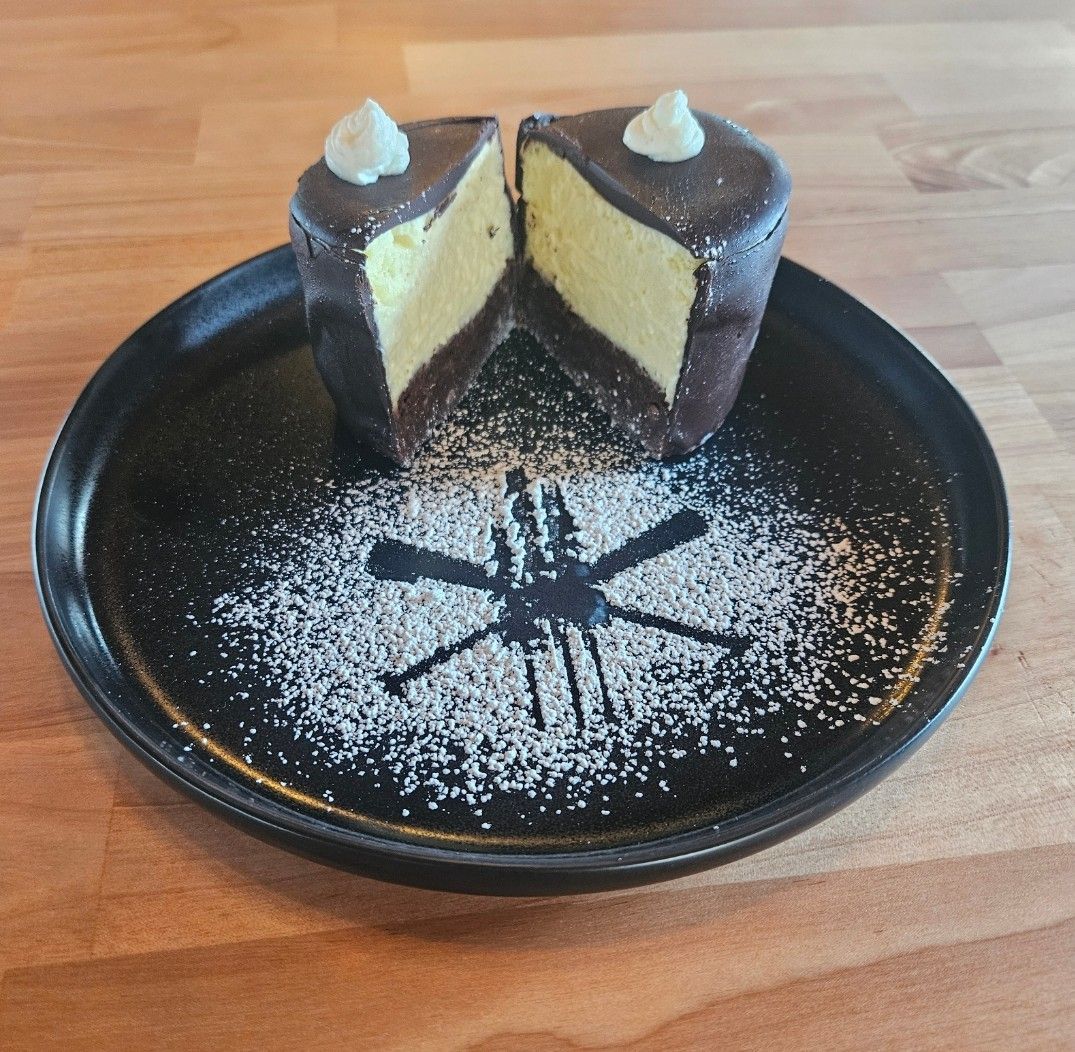 cake on a black plate 4
