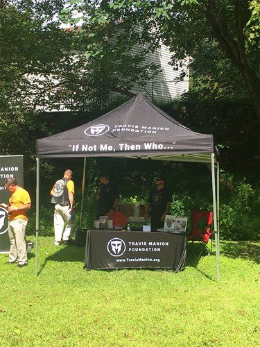 A black tent with the 