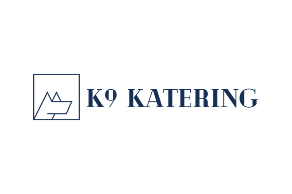A logo for k9 catering with a mountain in a square.