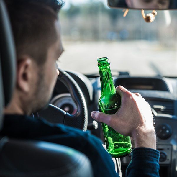 Man Drinking Beer While Driving a Car — Muskogee, OK — Ching Law