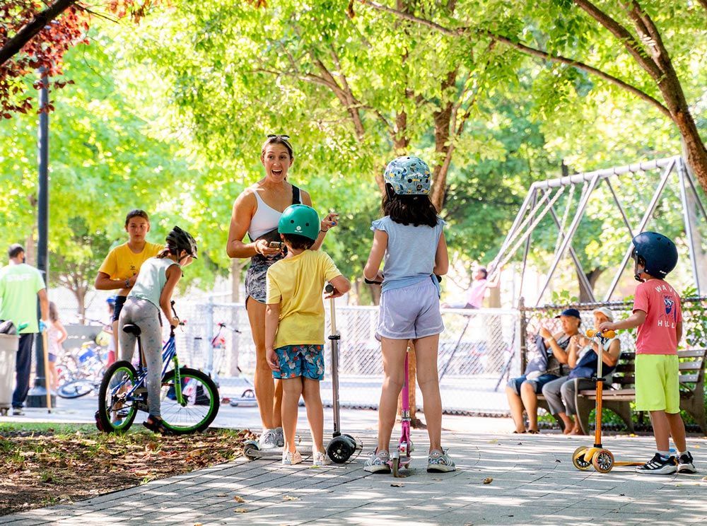 Kids Riding bikes at a park in Long Island City