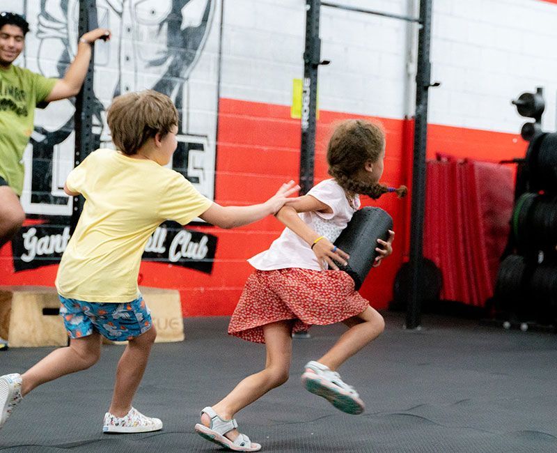 Kids playing tag at an afterschool program