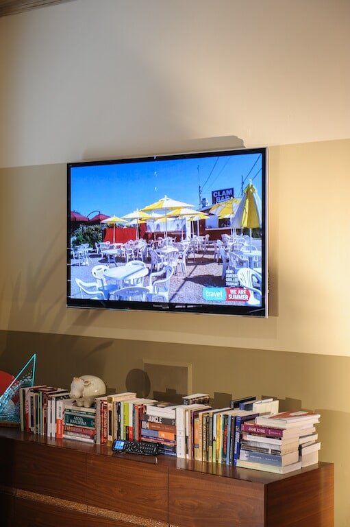 TV set with storage cabinet — Home AV TV & Design in Carlsbad, CA