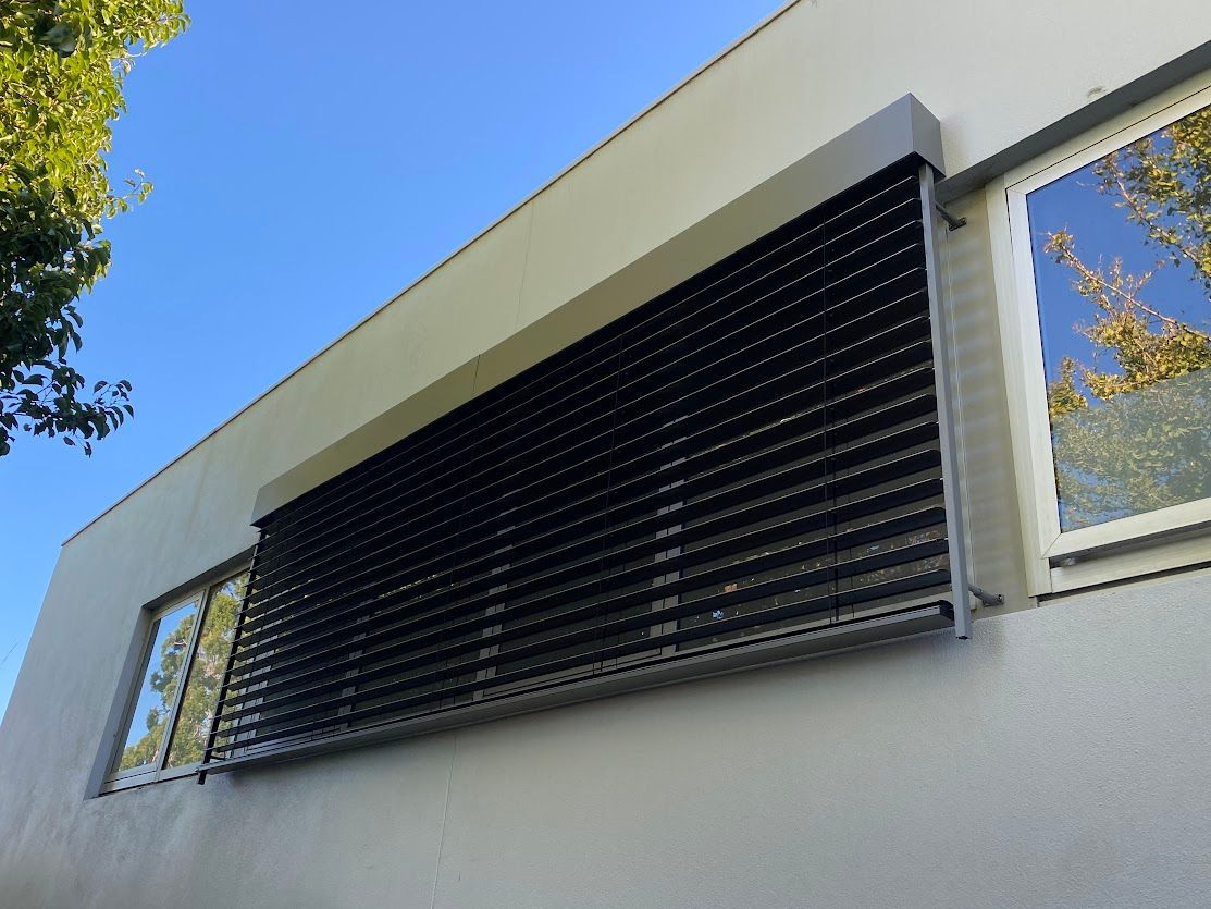A Window With PVC Blinds on it— Night & Day Blinds and Awnings in Pakenham, VIC