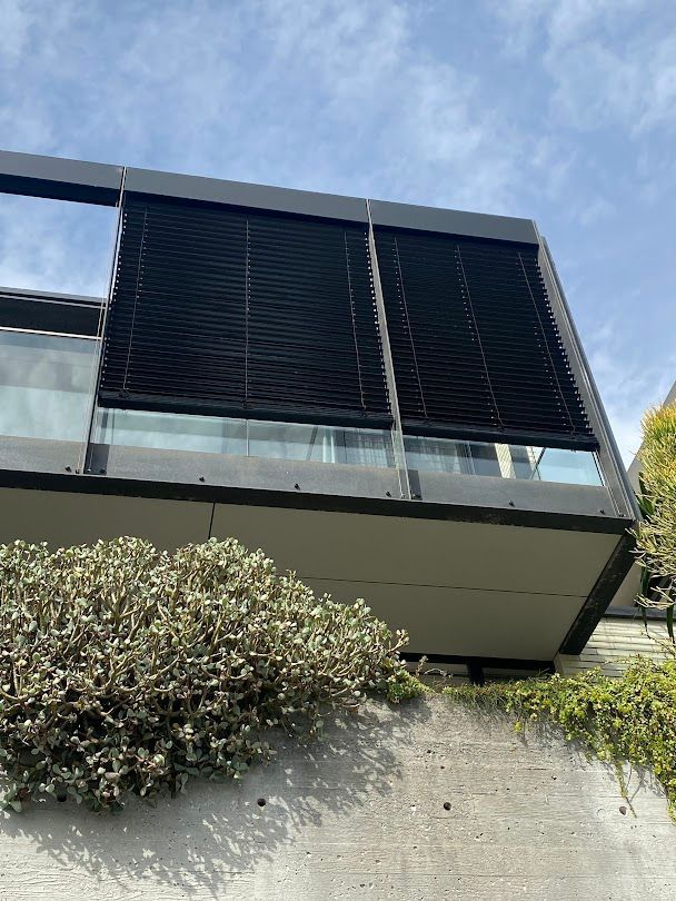 A Patio With A Screen On The Side Of It  — Night & Day Blinds and Awnings in Pakenham, VIC
