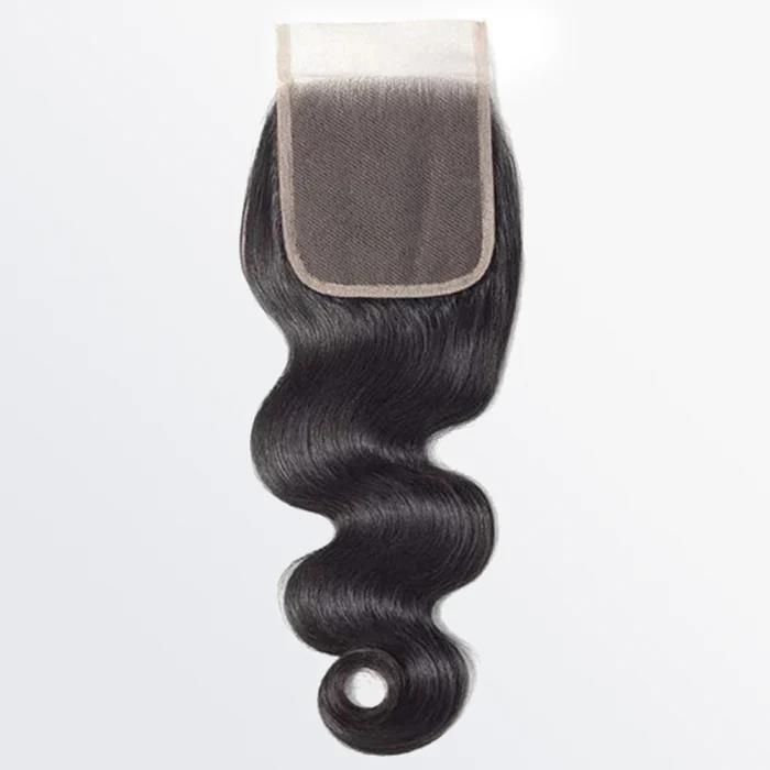 A piece of hair with a lace closure on a white background.