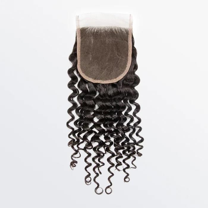 A lace closure with curly hair on a white background.