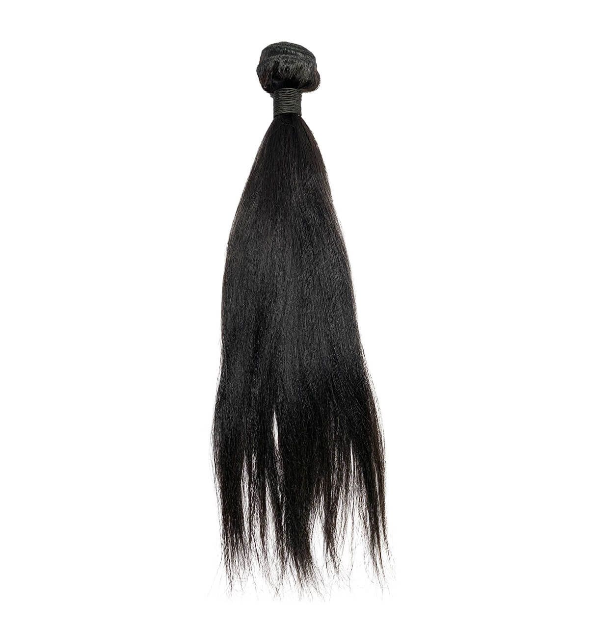A close up of a piece of black hair on a white background.