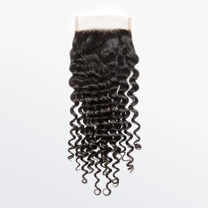 A lace closure with curly hair on a white background.