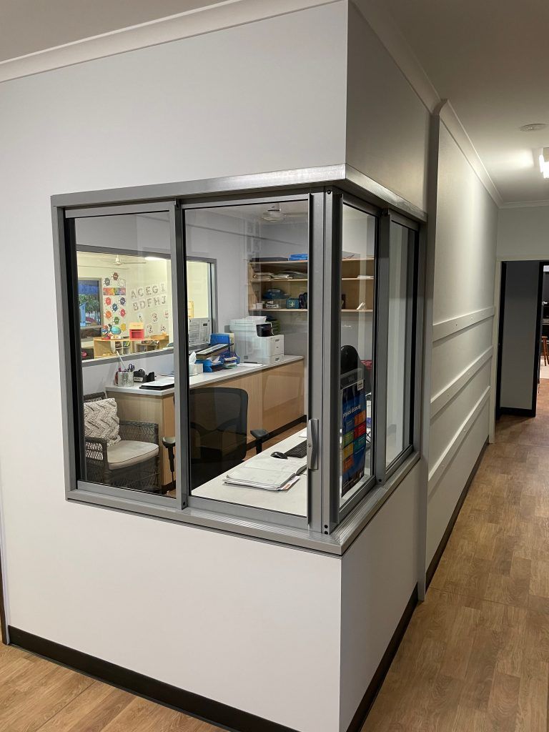 There is a Large Window in the Corner of the Room — Ideal Glass In Winnellie, NT