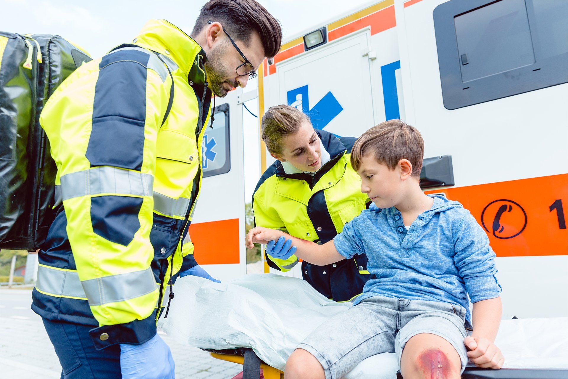 Paramedics Treating Child Wound