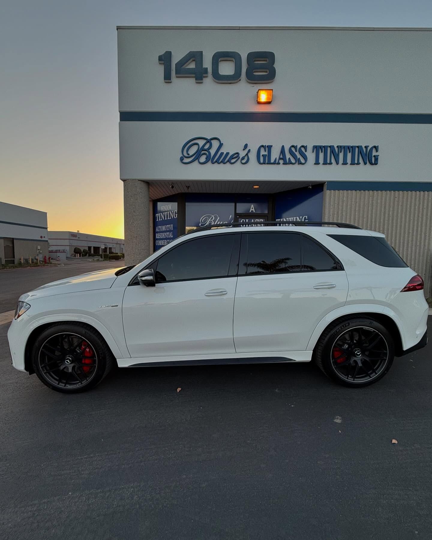 White SUV parked in front of