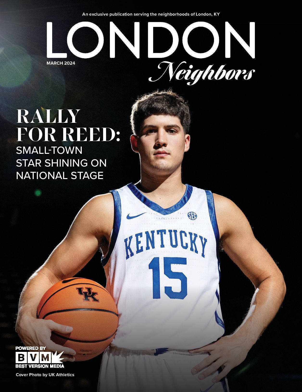 Magazine cover featuring a basketball player in a Kentucky jersey holding a ball. 