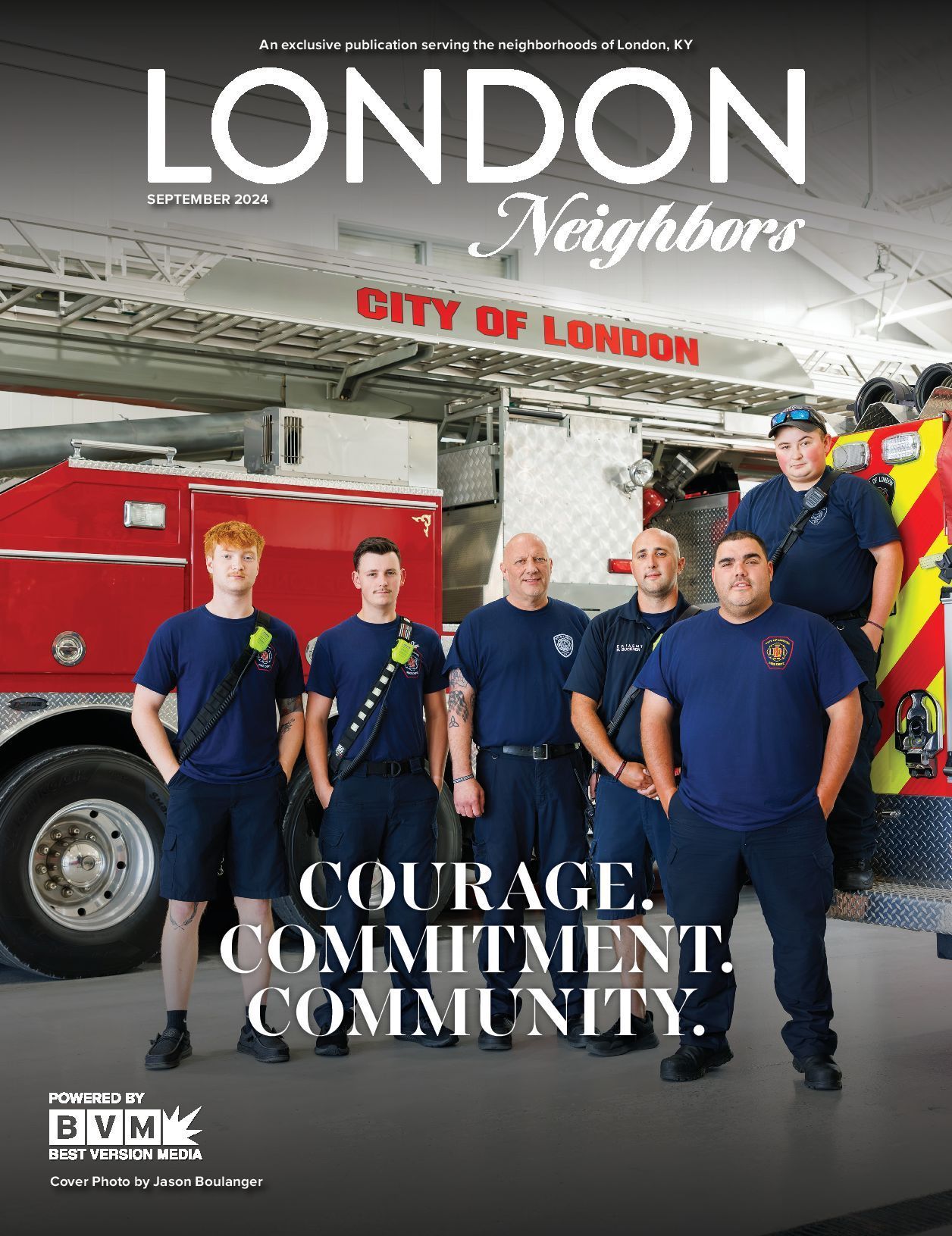 Firefighters in front of a fire truck. Text reads 