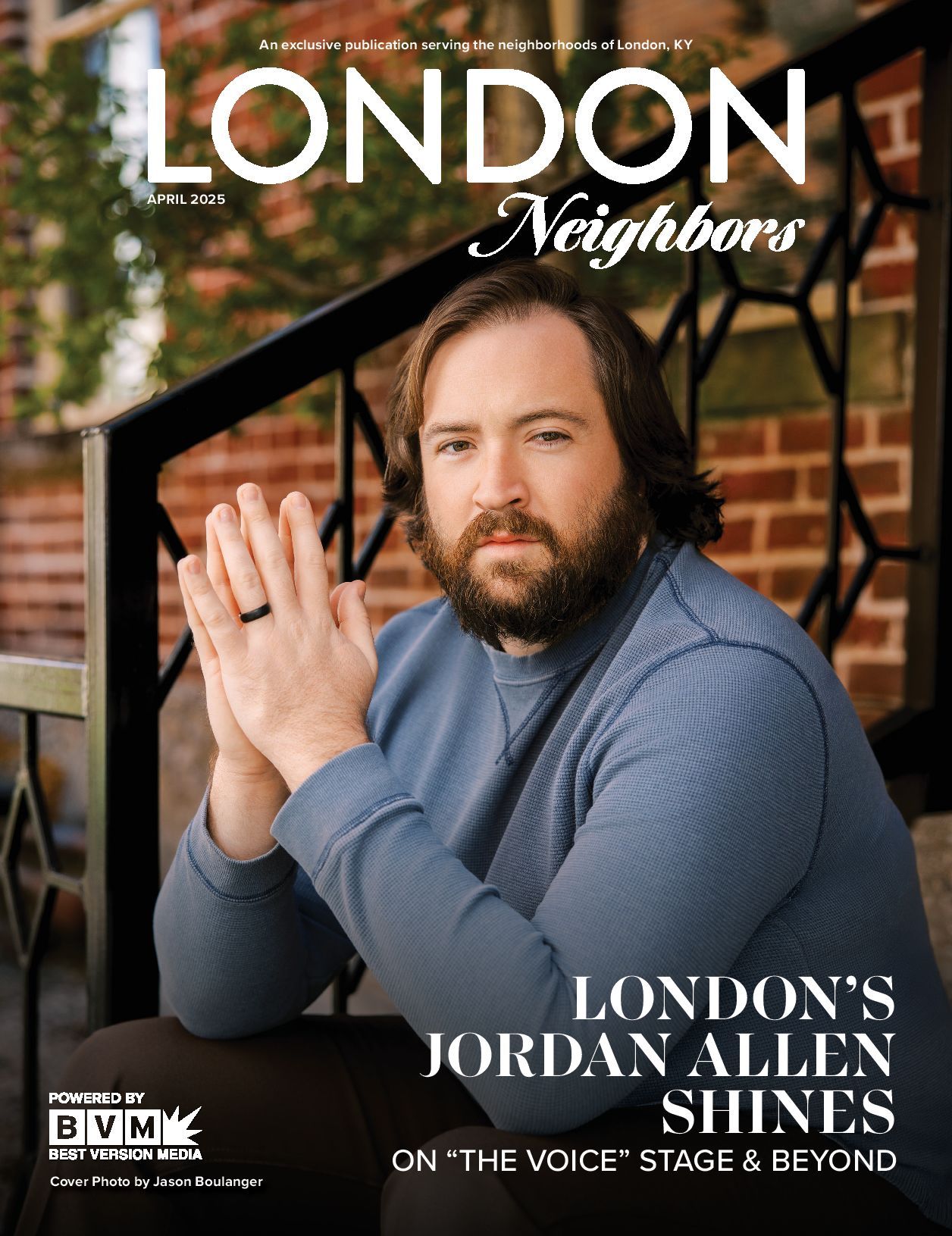 Man with beard sits on steps, featured on 