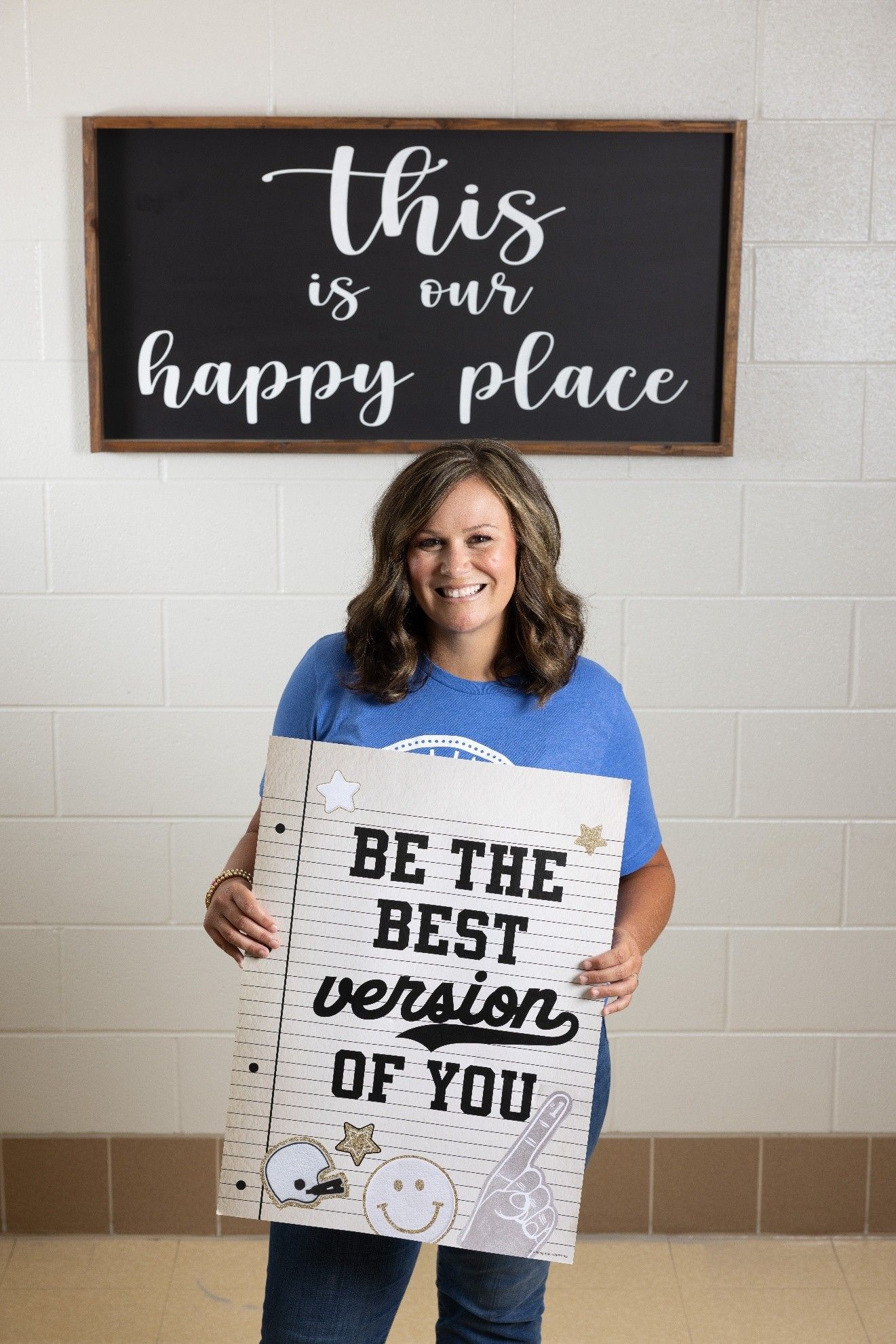 Woman holding sign that says