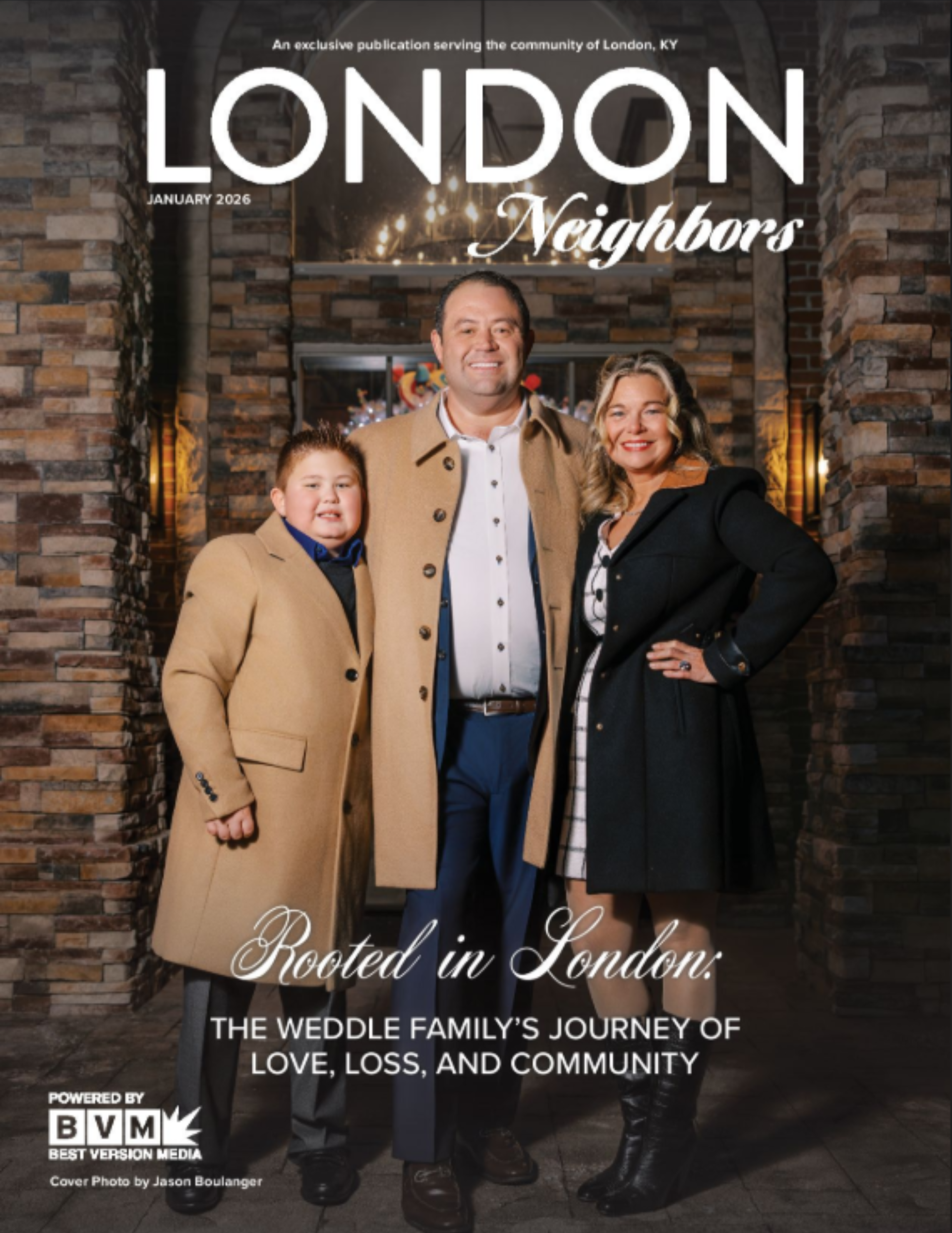 Family portrait on magazine cover: father, son, and mother pose near a stone building. 