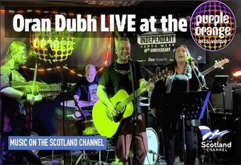 Join us as acoustic folk-rock band Oran Dubh perform live at Bathgate’s Purple Orange Arts Venue. Oran Dubh features the vocal talents of Claire Gibson and John Strachan, the emphasis is very much on the songs which are uplifting and poignant; being about peace, love and hope.
The line up has vocals, drums, bass, acoustic guitar and a combination of mandolin/banjo/whistle being played by multi-instrumentalist Hugh Stewart. 
Hailing from Glasgow and the West Coast of Scotland, Oran Dubh perform memorable, uplifting and original songs.