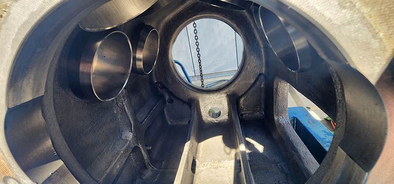 A close up of a metal object with a hole in the middle.