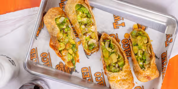 A close up of a tray of food on a table.